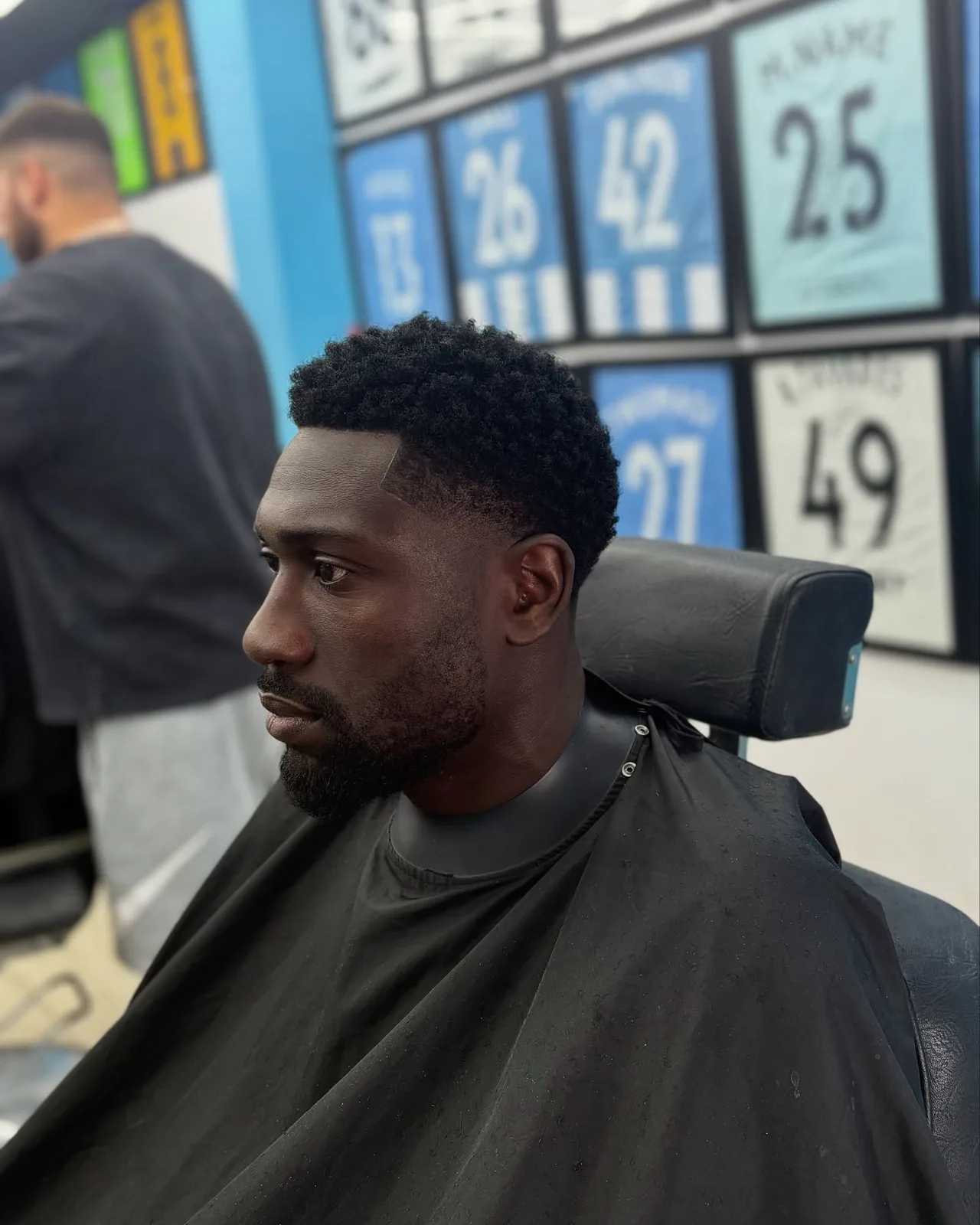Short curls, tight taper