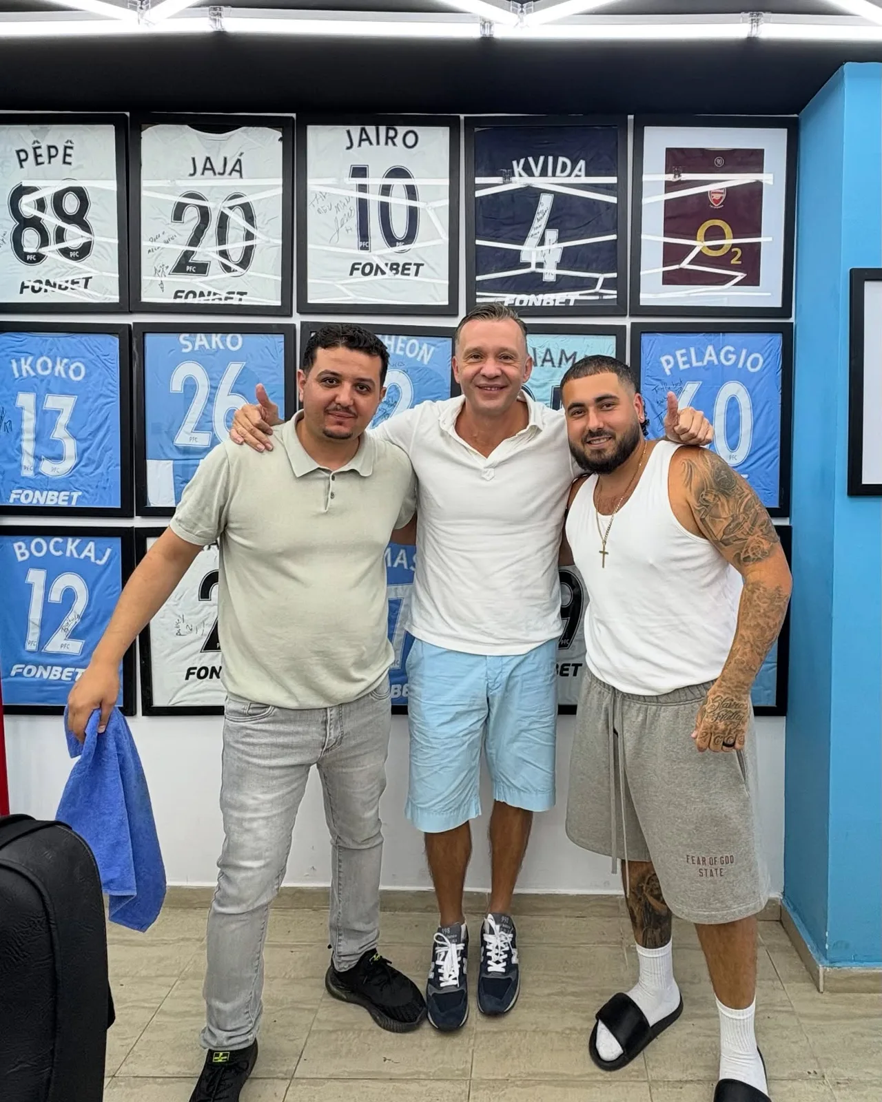 The crew at the shirt wall